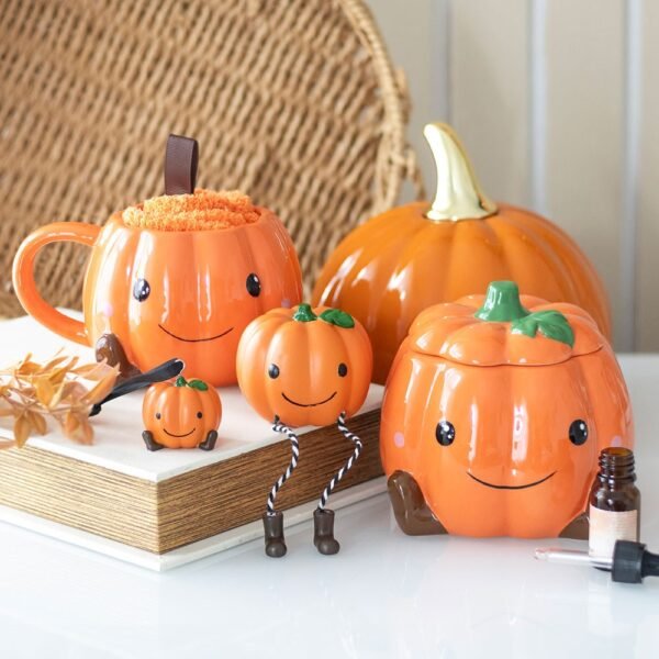 quemador de aceite y calentador de cera con forma de calabaza sonriente