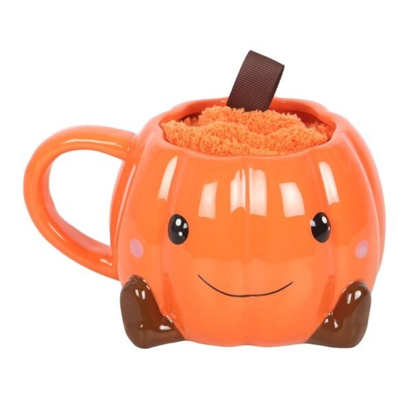 juego de taza y calcetines con forma de calabaza sonriente