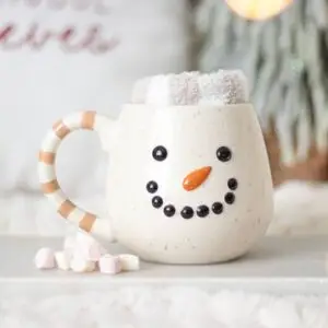 juego de taza y calcetines de muñeco de nieve