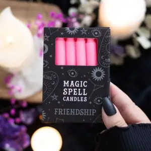 Paquete de 12 velas rosas con el hechizo "Amistad"