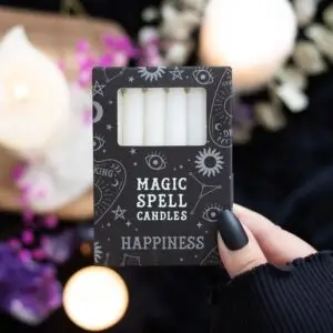 Paquete de 12 velas blancas con el mensaje "Felicidad"