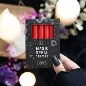 Paquete de 12 velas rojas con el mensaje "Amor"
