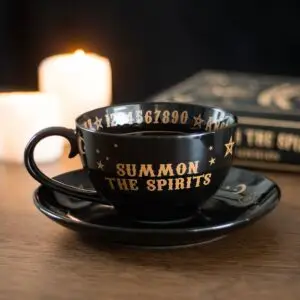 Taza de Té y Platillo con Tablero Parlante Negro