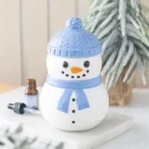 Quemador de aceite Muñeco de nieve en una escena invernal decorativa